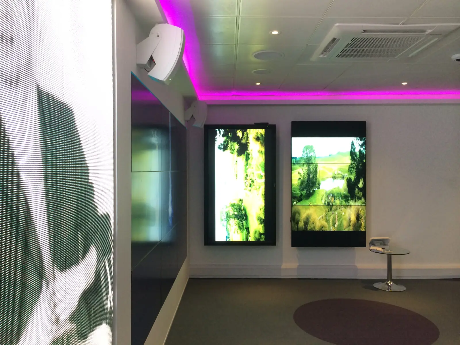 PEL UK Offices space with designer furniture and wall mounted digital screens 26